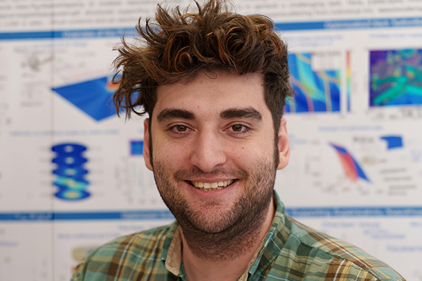 A professional headshot of an individual